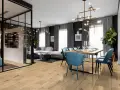 Nowoczesny salon z jadalnią, gdzie drewniana podłoga kronostep tworzy ciepłą bazę dla eleganckich mebli i designerskiego oświetlenia.