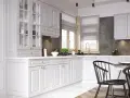 Elegancka kuchnia z białymi szafkami. Dowiedz się, jak wyregulować szafki kuchenne wiszące, by idealnie pasowały.