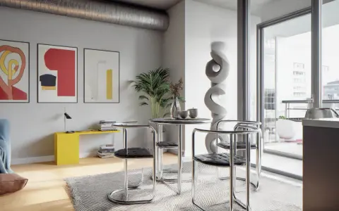 Nowoczesne wnętrze w stylu bauhaus: okrągły stolik z krzesłami, abstrakcyjne obrazy na ścianie i designerska rzeźba.