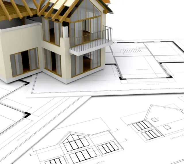 Model domu na planach architektonicznych. Zastanawiasz się, ile trwa budowa domu? To zależy od wielu czynników, ale zaczyna się od projektu.