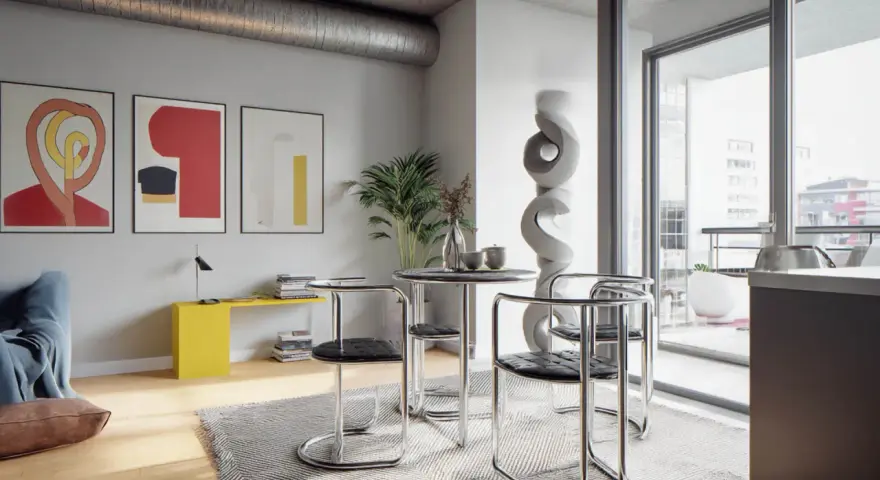 Nowoczesne wnętrze w stylu bauhaus: okrągły stolik z krzesłami, abstrakcyjne obrazy na ścianie i designerska rzeźba.